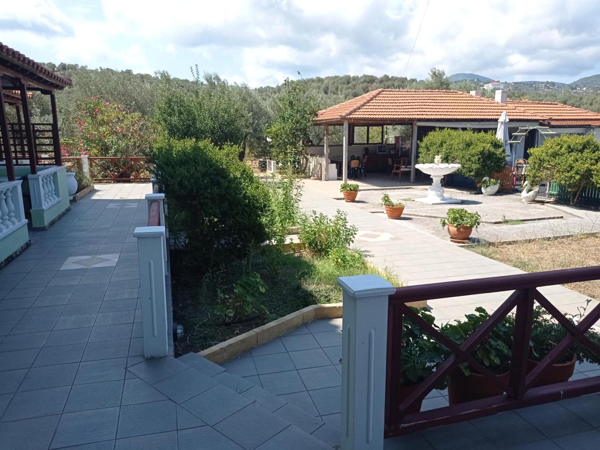 סקופלוס טאון Alexandros Rooms & Studios מראה חיצוני תמונה