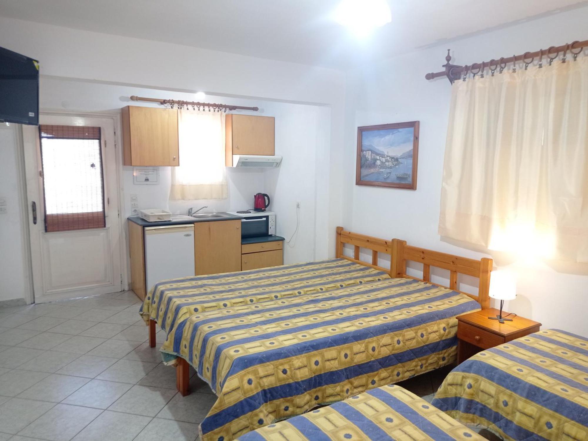 סקופלוס טאון Alexandros Rooms & Studios מראה חיצוני תמונה